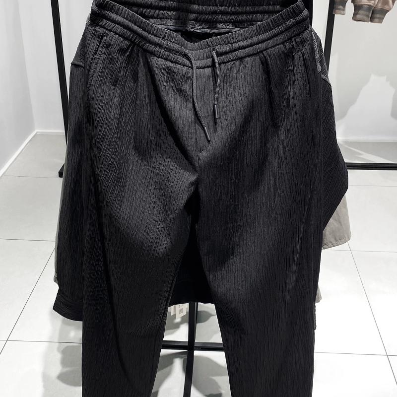 Marchandises de haute qualité Pantalons décontractés pour hommes Texture en relief Taille élastique ample Jambe droite Couleur unie Pantalon en p