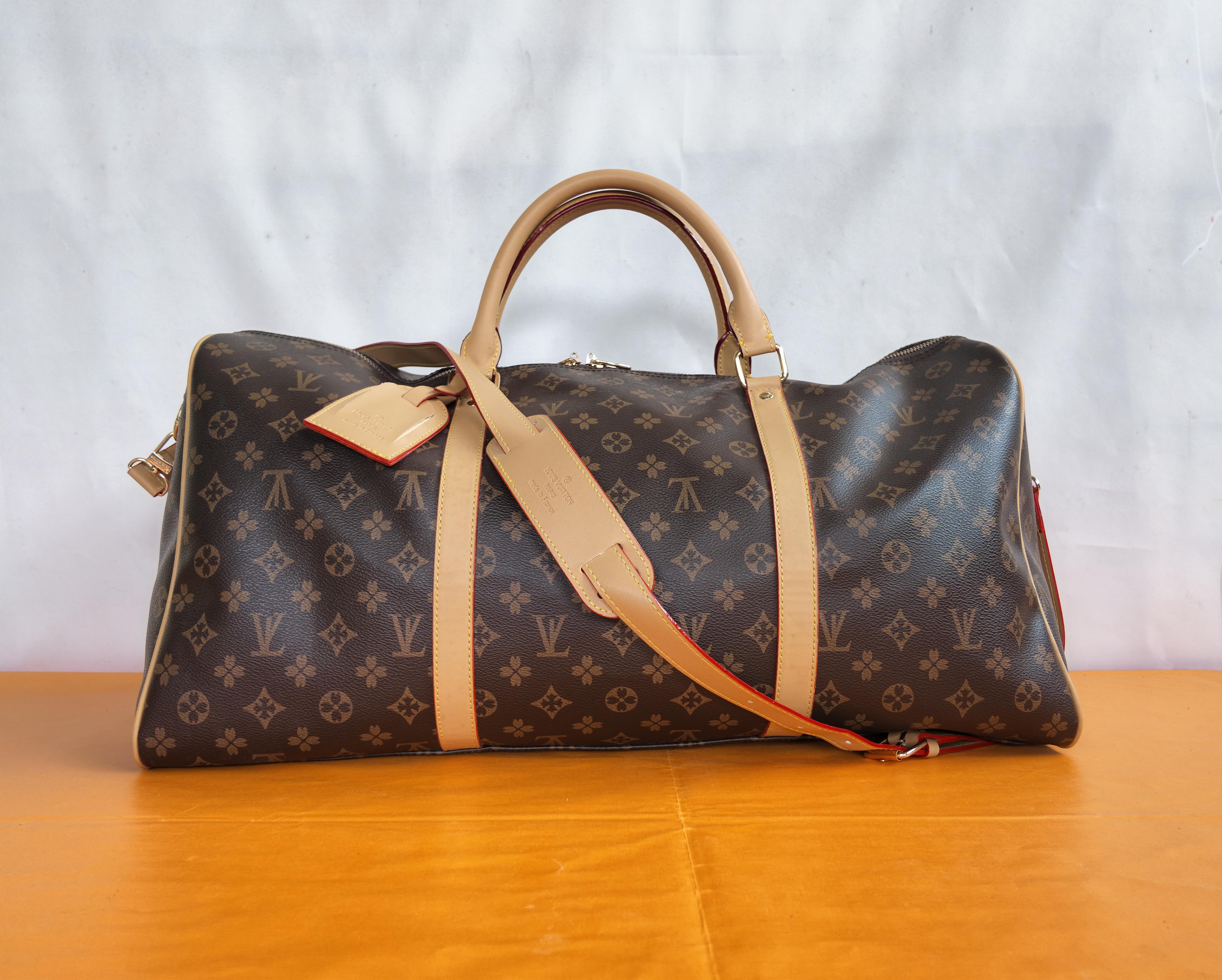 Designers Sacs Duffel Hommes de luxe Femmes Sacs de voyage en cuir grande capacité fourre-tout bagage à main sac de week-end sac à main