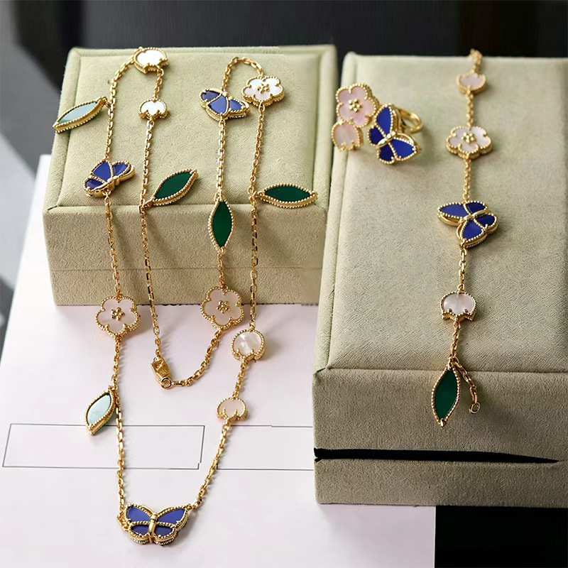 Tout nouveau ensemble de bijoux trèfle classique émail papillon pull chaîne bracelet bague en acier inoxydable plaqué or 18 carats bijoux pour fe