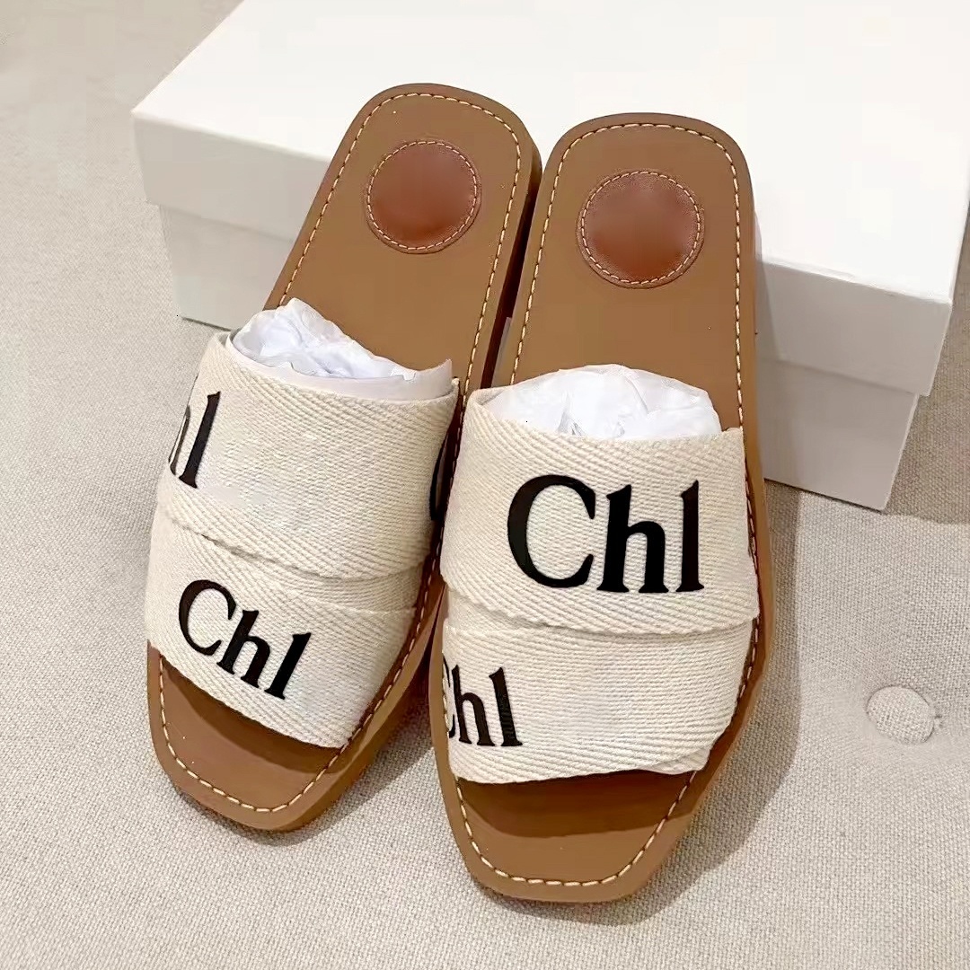 luxurys Designer Slippers Sandal Hot Canva Top quality Fashion Sexy Summer Beach wood Slide pool Women Open Toe Mule Casual shoe Flat Woven Strap Ho
