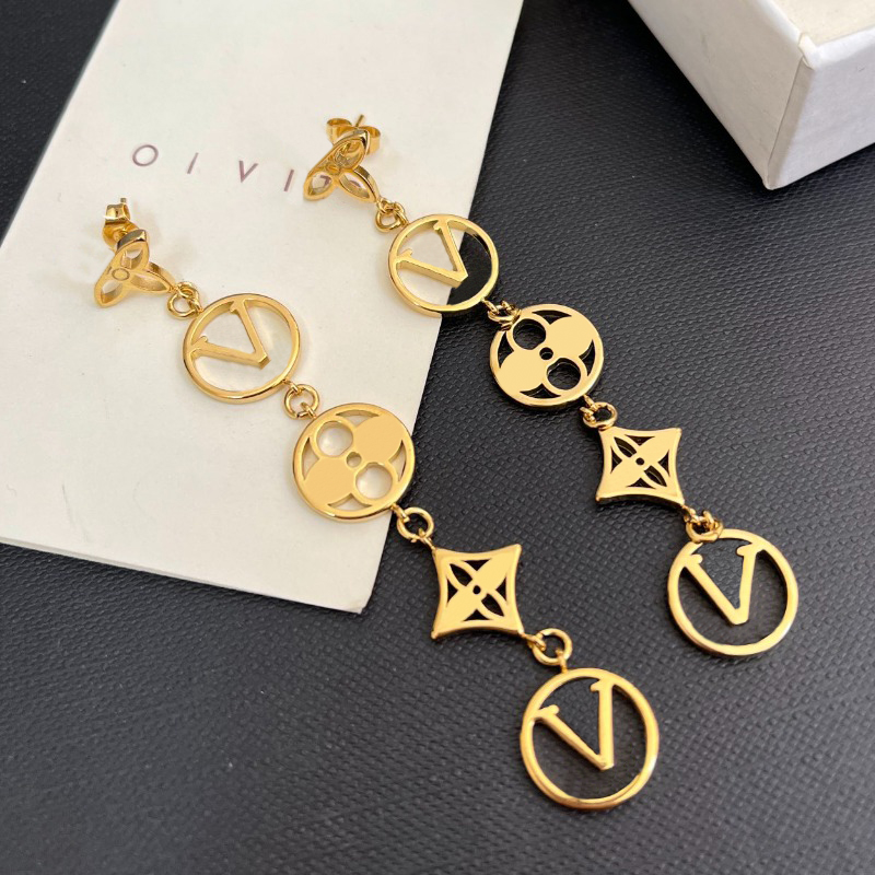 Light Luxury Retro Hollowed Out Logo Tassel Earrings Gold Multi Piece Spliced Earrings Elegant Womens Eye Catching Jewelry Worn For Dates And Partie