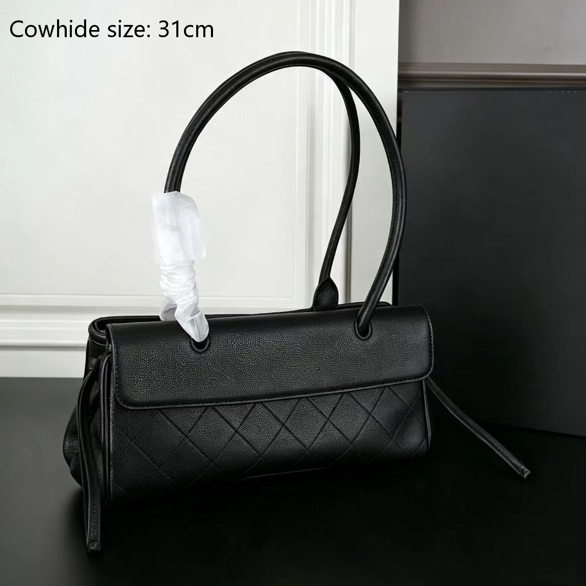 Sac de baguette de concepteur de haute qualité Sac fourre-tout de mode Premium en peau de vache Conception de cordon latéral Grande capacité Nouv