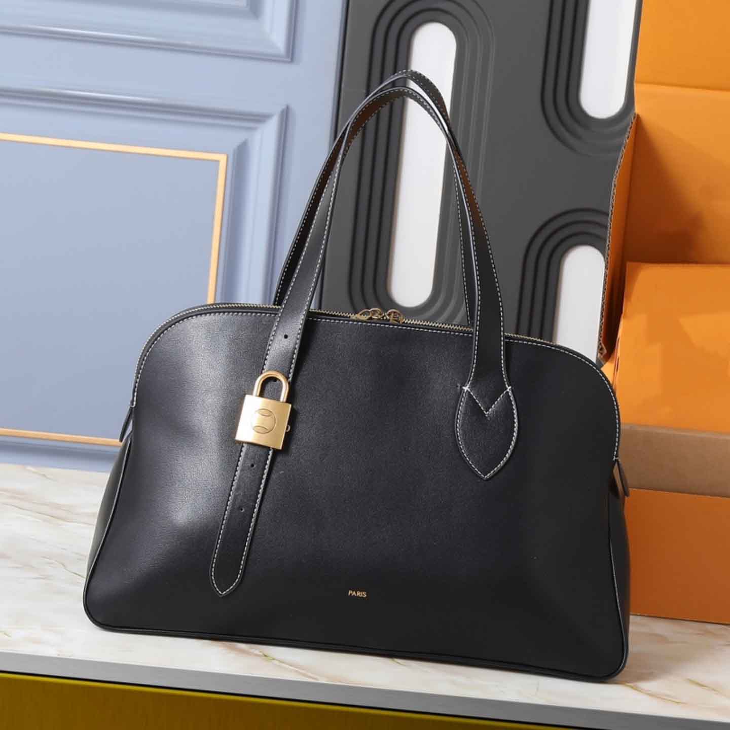 26SS Hommes Femmes Luxurys Designer Low Key Duffle Totes Sacs en cuir Loquet Sac à provisions Peintures Sac à main Sac à bandoulière Sac de banli