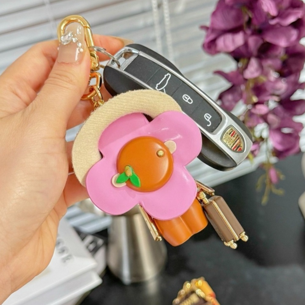 Charms pour sacs de luxe Tournesol Designer Porte-clés Charme de luxe Porte-clés pour femmes Lettres en cuir Longes Sac Charms Pendentif Porte-cl