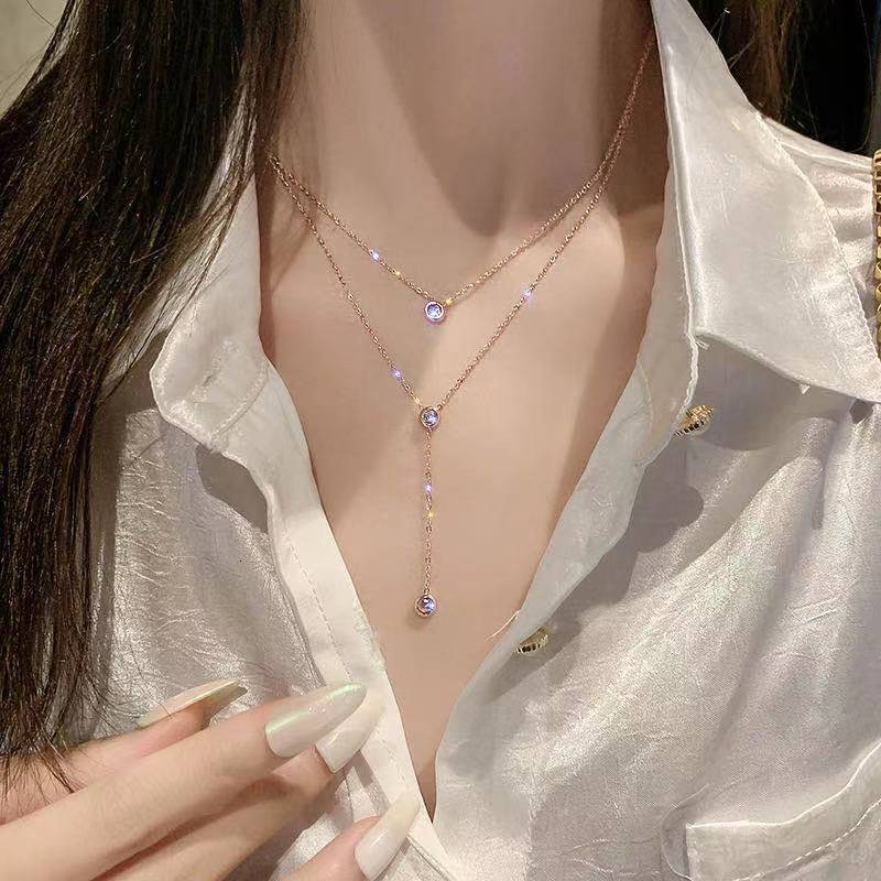 Collier à pampilles Double couche en acier et titane, chaîne de pull pour femmes, chaîne européenne et américaine
