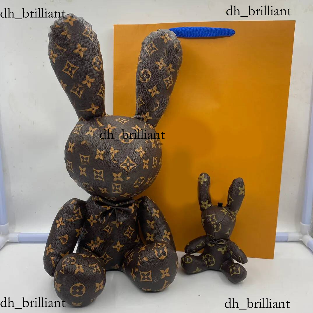Designer Lapin Porte-clés De Luxe Fleur Lettre Trèfle Sac Charme Voiture Pendentif Porte-clés Lanières Décoration pour Hommes Femmes Mode Bijoux