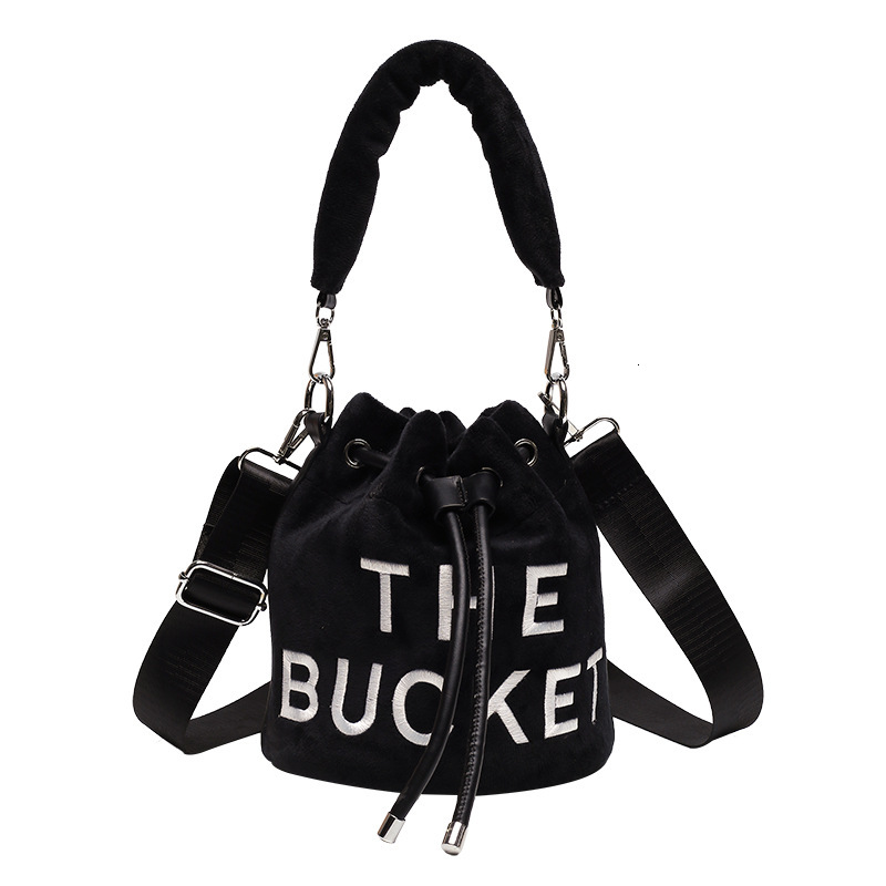New Fashion Women's Bucket Trend Brand Personality Plush Shoulder High end Elegant Crossbody Bag Designer Luxury Handbag e4
