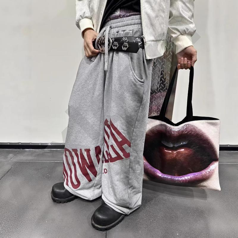 Pantalon de survêtement de luxe pour hommes avec cordon de serrage, taille élastique, grande lettre sur le devant, imprimé graphique, poche latér