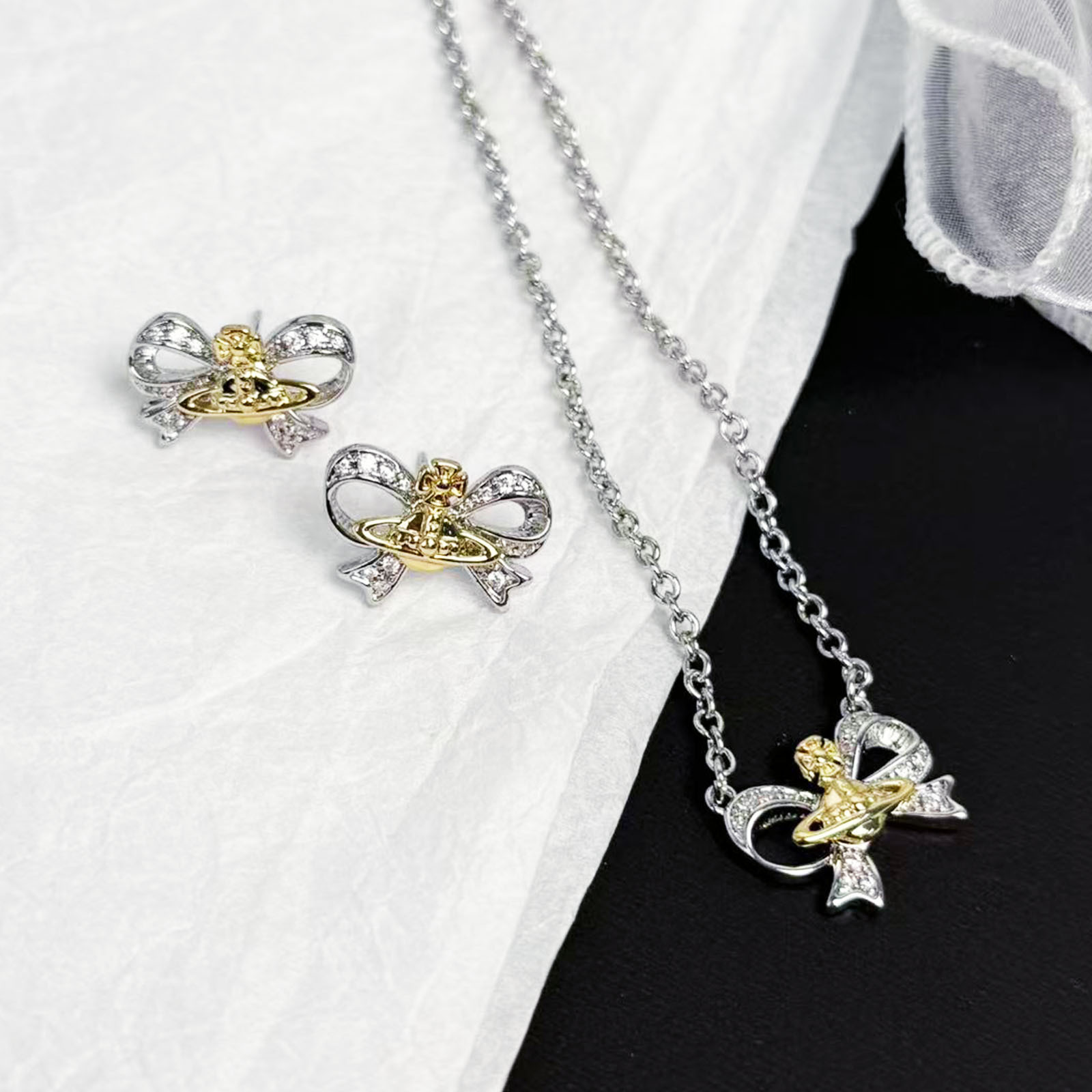 Classic Designer Silver Plated Zircon Bow Planetary Pendant Earring Necklace Luxurious High End Gift Suitable For Womens Exquisite Jewelry Matching