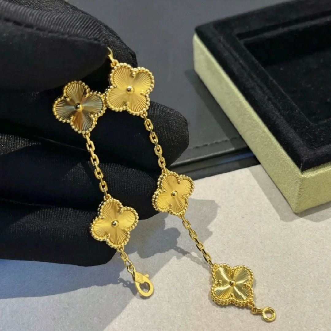 designer jewlery for women lucky gold clover bracelet ladies elegantly designed charm mother of pearl beads set in durable stainless steel four leaf