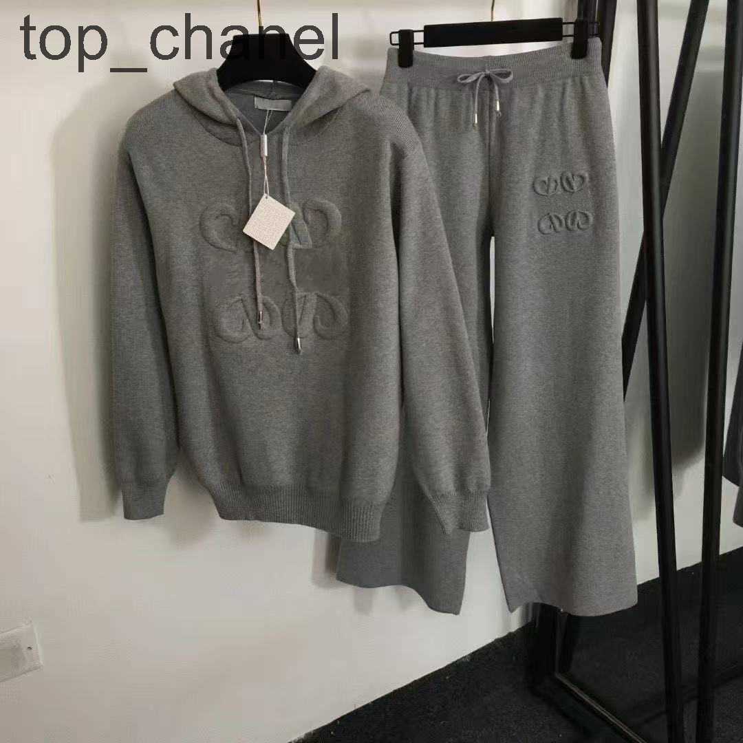 Women's Two Piece Pants Hooded drawstring sweater fashion trend autumn and winter knitted two-piece casual loose suit for men and women.