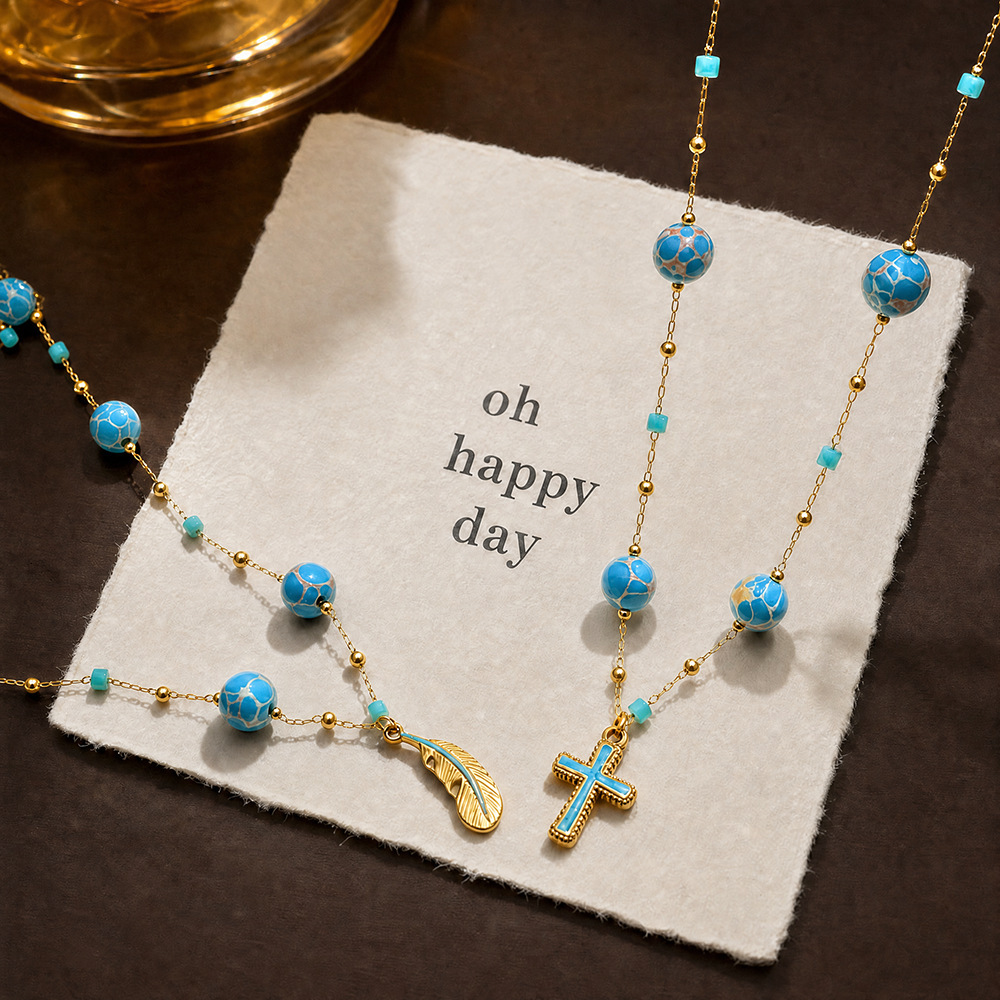 French-Style Vintage Blue Cross Titanium Steel Necklace, Fashionable Elegant Piece With Touch Of Luxury, Featuring A Unique Feather And Enamel Desig