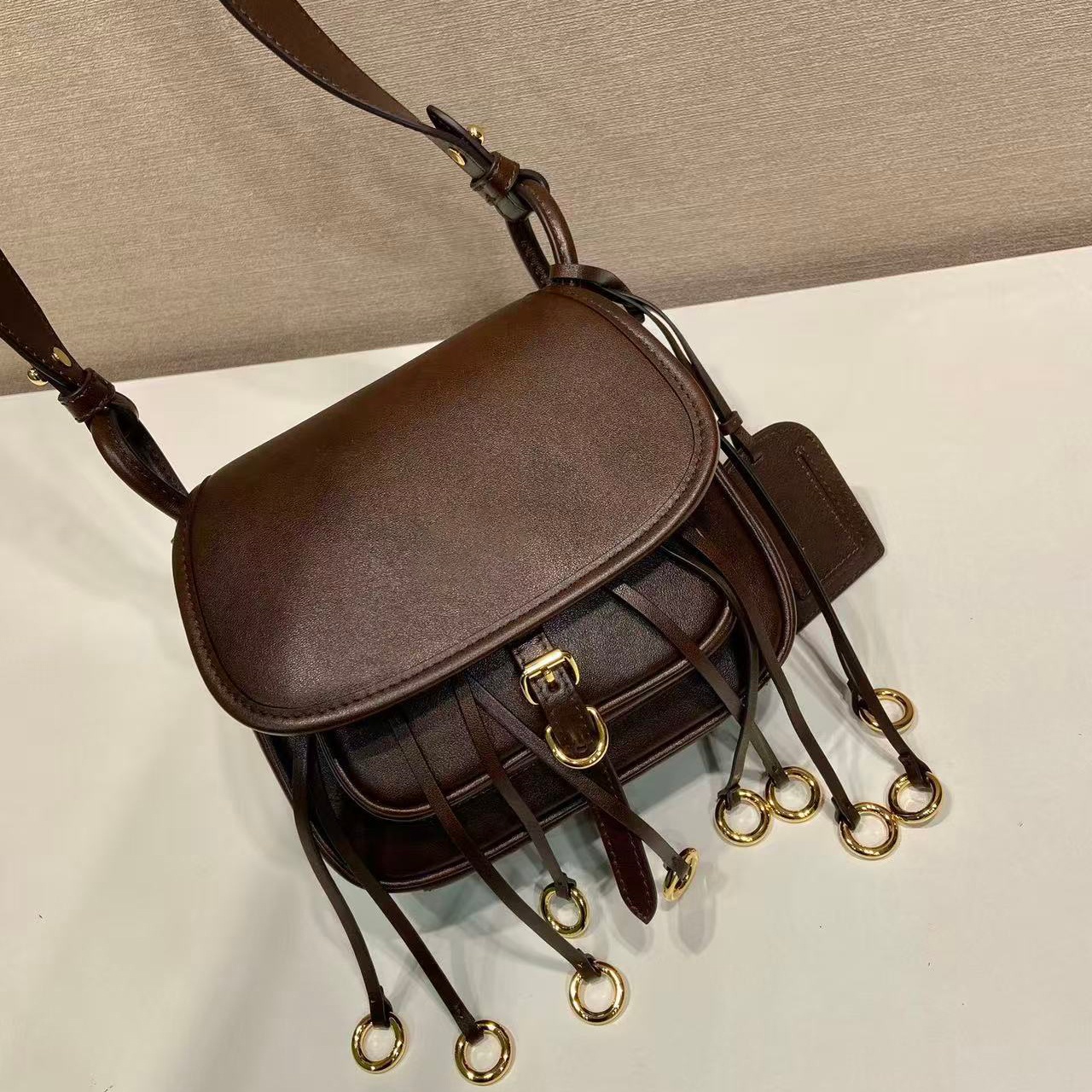 10A designer corsaire aged leather mini shoulder bag luxury Saddle bags women Flap Purse Tassel Gold Metal Rings Decor Crossbody Small Handbag Vinta