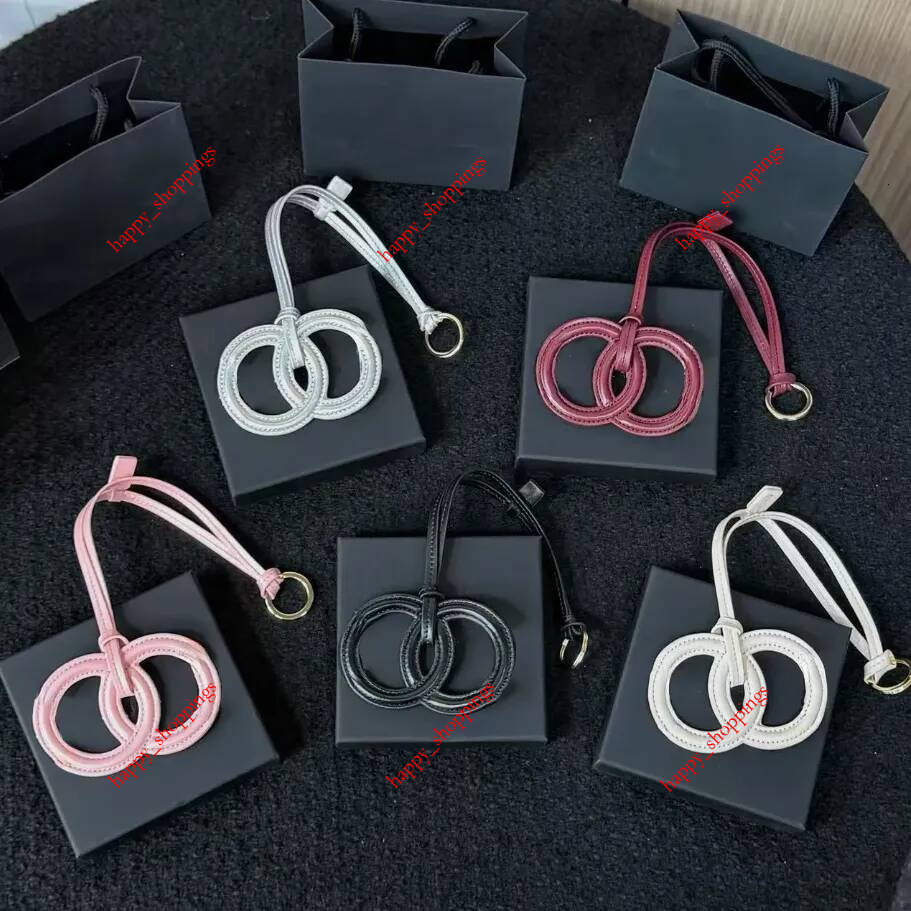 Luxury Designer Key Chain Bag Charm Keychain Handmade Sheepskin Leather Keychains Man Woman Mini Wallet Bags Pendant Coins Purse Accessoriess