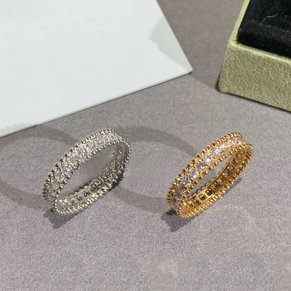 perfume 2026 1:1 Iced Four Leaf Clover Ring Natural Shell Gemstone 925 Silver Designer For Woman T0p Quality cologne Official Reproductions Diamond