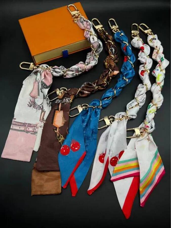 2026 Lanyards Portable Scarf 11Styles cologne Designer Key Chain Bag Purse Silk perfume Cherry Charm Keychains Luxury ss9