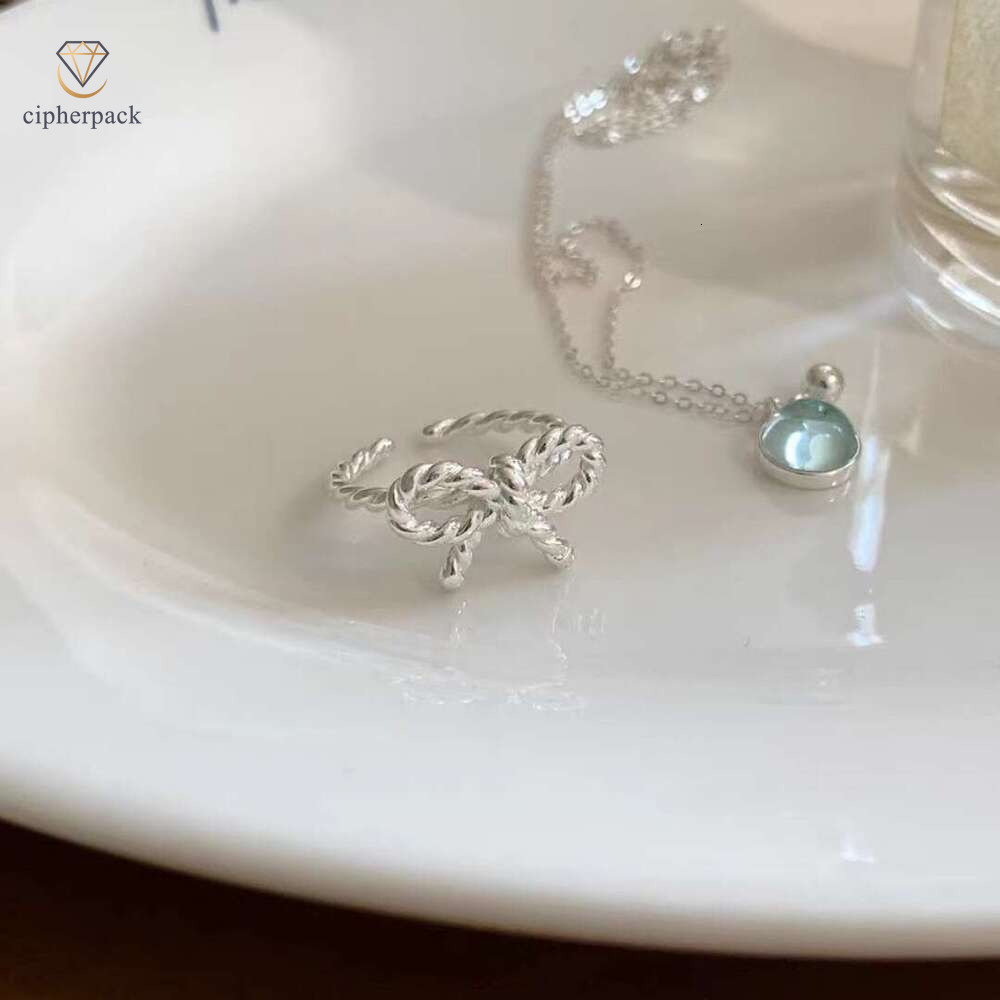 Korean-style sweet twisted bow ring women, fashionable and unique, suitable for stacking on the index finger, with a high-end feel