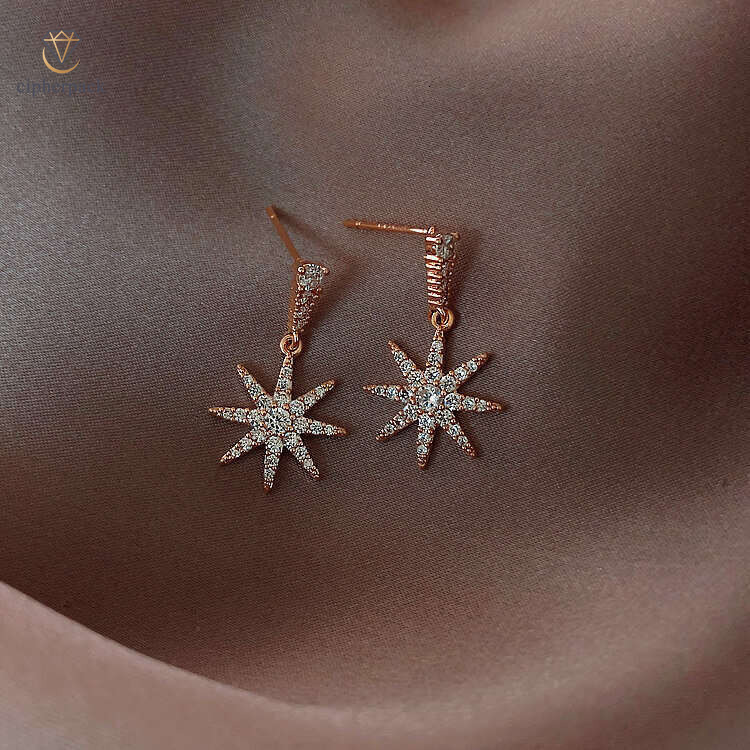 Korean-style diamond-studded snowflake pendant for women, light luxury high-end design, niche exquisite, versatile and fashionable earrings