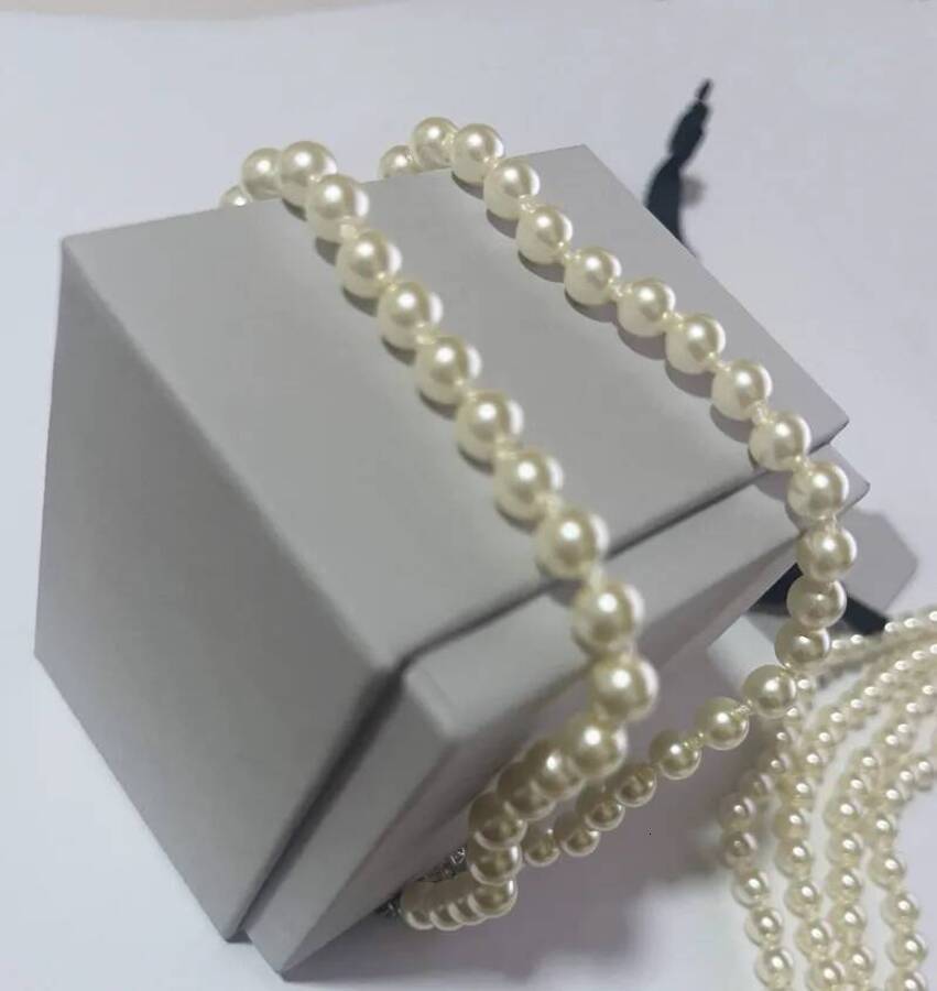2026 Pendant Necklaces Fashion Brand Chokers Luxury Women Jewelry Designer cologne Brand Pearl perfume Necklace Saturn Necklace Punk Clavicle Chain