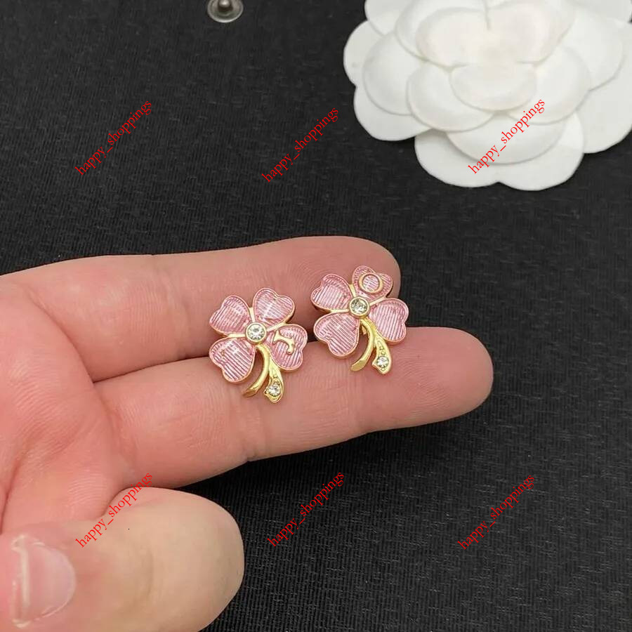 New Brand Designer Sweet Enamel Four Leaf Clover Stud Earrings Gold Plated Crystal Accent Lucky Flower Ear Jewelry For Ladies Casual Party Wear