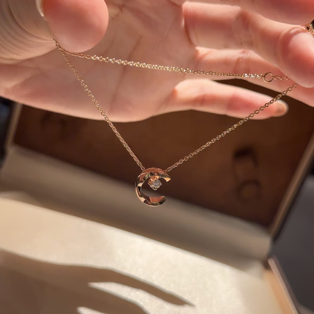 Designer Jewelry Coco Water Ice Moon Diamond Pattern Necklace, Rose Gold Plated, Half-Moon Pendant, Unique and Luxurious Clavicle Chain for Women
