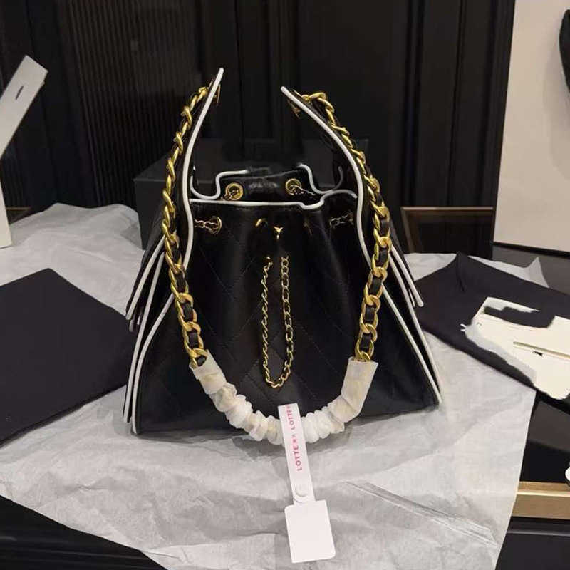 Tweedstyle drawstring bucket bag a fashionable new design for women with large capacity can be carried as shoulder or crossbody and features highend