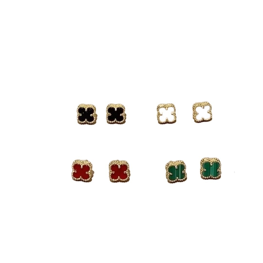 Designer Jewelry vanly Four-leaf clover mini earrings, featuring natural mother-of-pearl and a thick plating with rose gold accents
