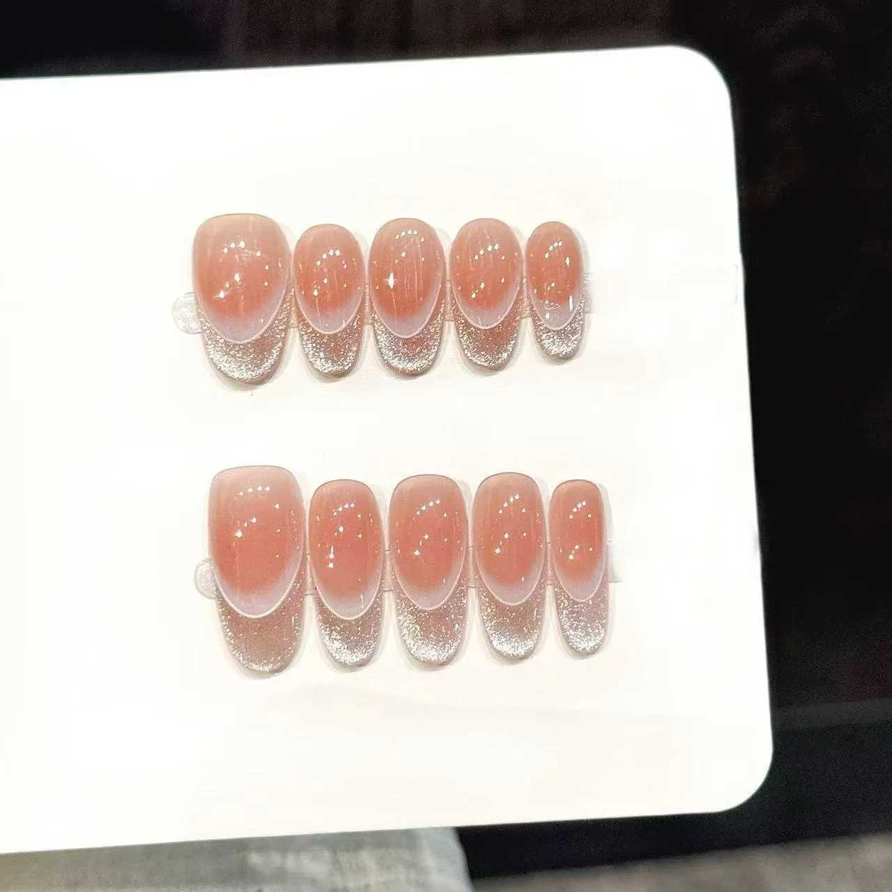 False Nails 10pcs Pure Hand Pressed Oval Nail Art Nice Fake Nails Gentle Nude Pink Flashing Silver French Cat's Eye Suitable For Women Q261017