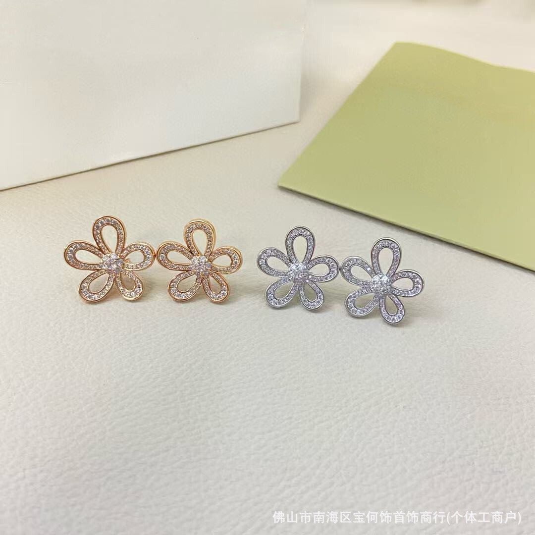 Designer Jewelry vanly sterling silver earrings, plated white gold, featuring a large flower design and fully encrusted with diamonds