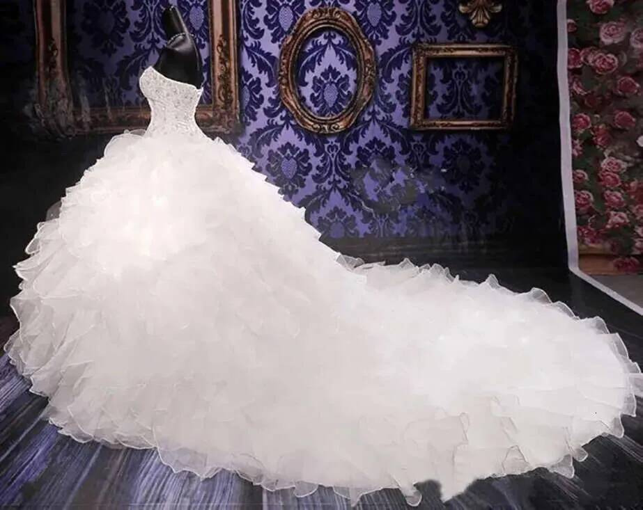 Luxury Beaded Ball Gown Wedding Dresses Sweetheart Organza Ruffles Princess Sweetheart Long Train Bridal Gowns