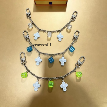 Designer bag pendant and luxurious multi-colored chain dice keychain, a bag charm, available for drop shipping