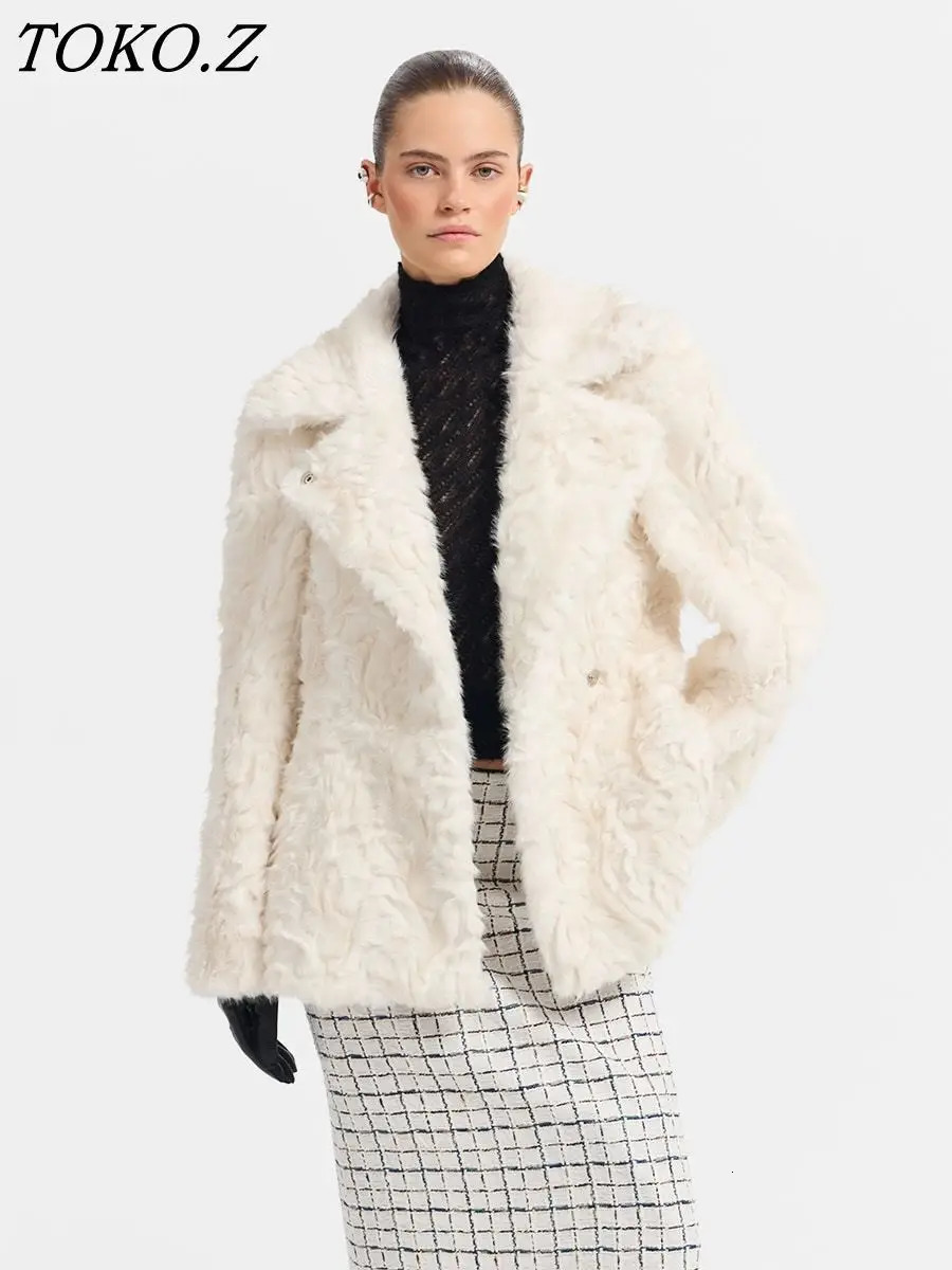 TOKO 2026 Women Textured Faux Fur Coat Notched Lapel Long Sleeve Loose Warm Winter Elegant Party Casual Outer Jacket 261017