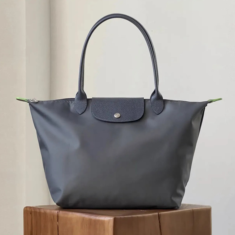 Top Designer Bag Tote bag Luxury Leather Messenger Shoulder Canvas Bag Handbag Fashion Wallet Outdoor Beach Bag Woman Shopping Bag High Quality Wall