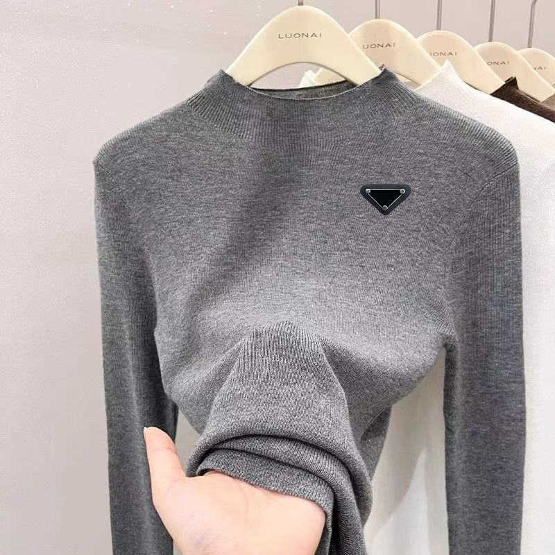 Women's Sweaters Luxury designer Autumn Winter New women sweater Round Neck Knitted Long sleeved Metal nameplate Design Slim and Versatile Bott