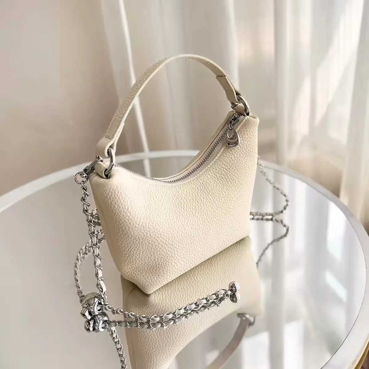 Evening Bags Totes Leather Women's Bag 2026 New Chain Crossbody Bag Niche Women's Hand-Held Crossbody Bag Small Bag Trend H261016
