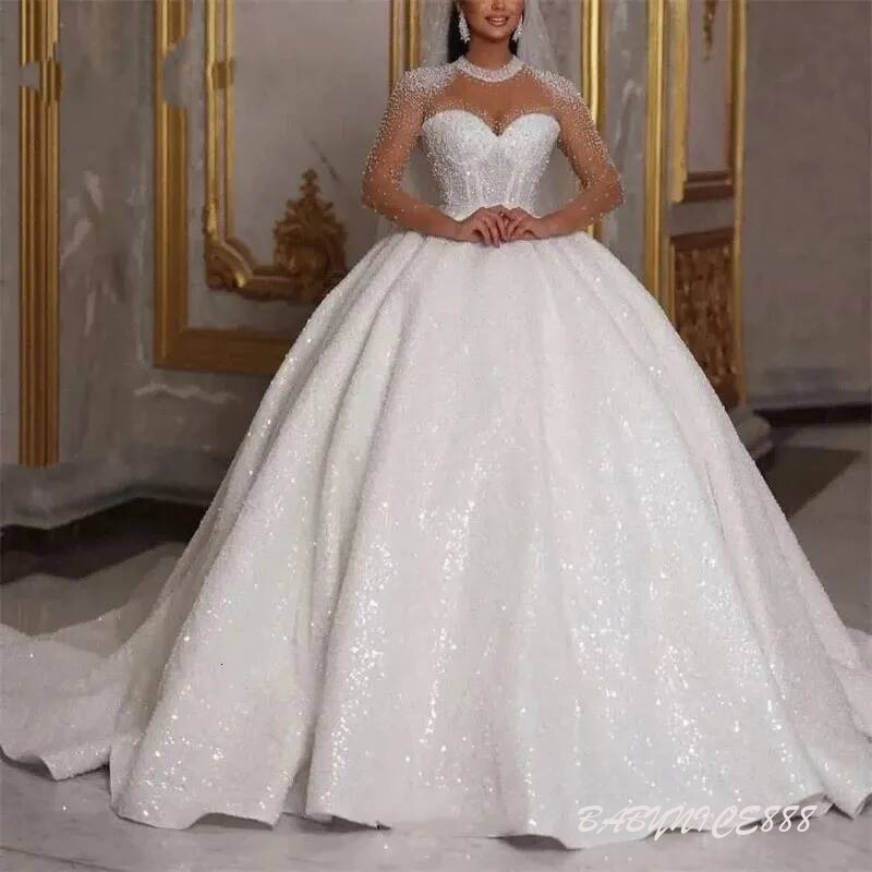 2026 Sparkly Sequined Ball Gown Wedding Dresses Beaded Long Sleeves Jewel Neck Princess Bridal Gowns Court Train Luxurious Arabic African Bride Dres