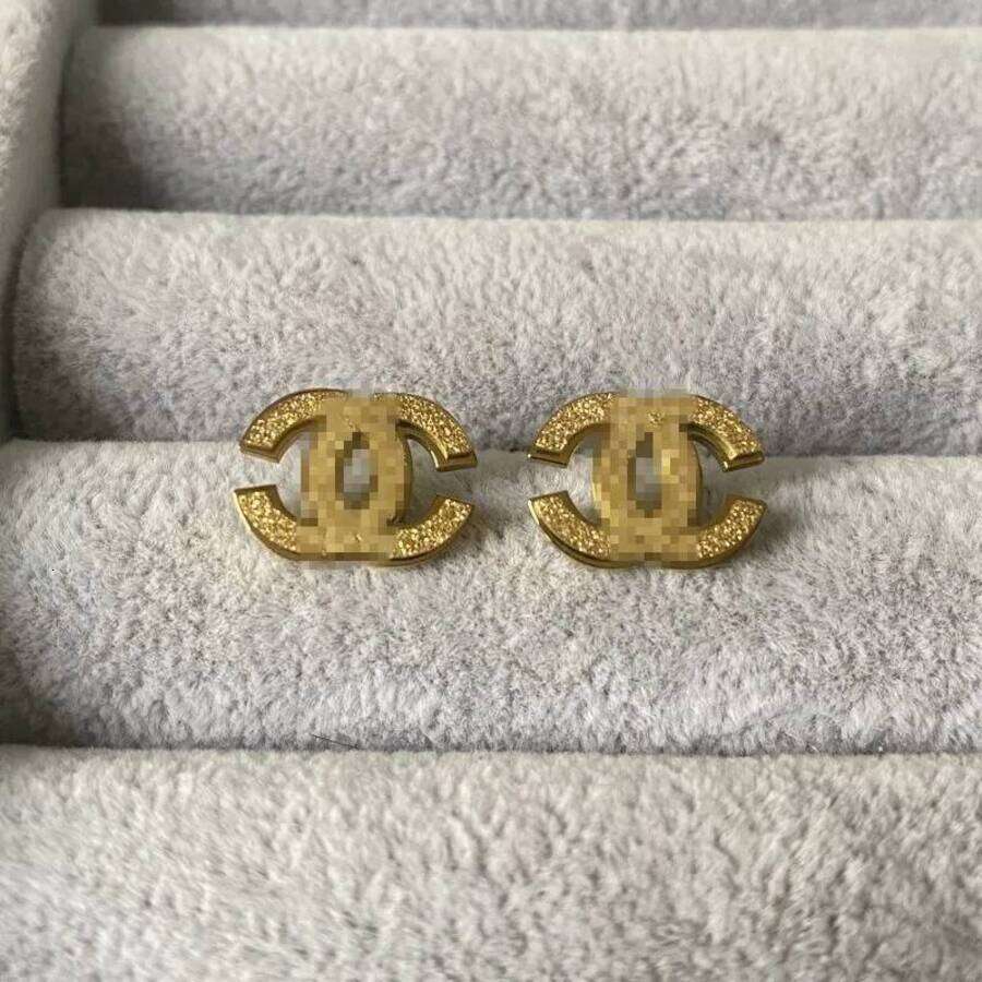 2026 Not Fading Luxury Designer Titanium Steel perfume Plated Frosted Fashion Earrings Trendy Jewelry For cologne Christmas ss9
