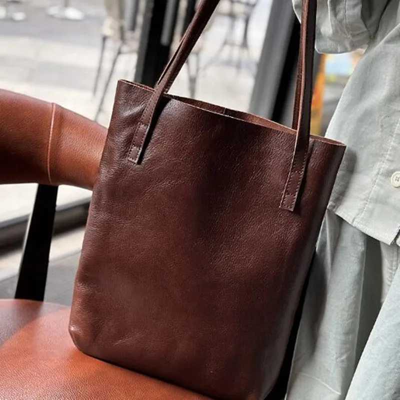 Evening Bags 2026 new fashion shopping bag leisure leather Tote baotou layer cowhide single shoulder bucket bag H261016
