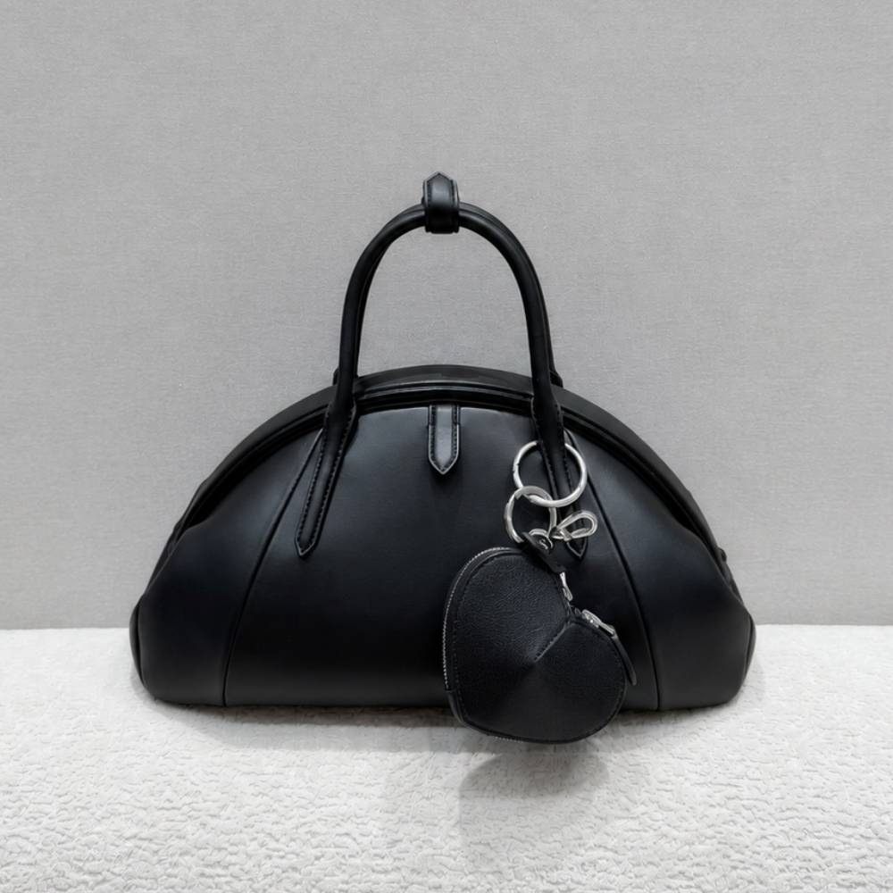 Structured Dome Shell Bag Calfskin Leather Curved Top Handle Heart Pouch Spacious Elegant for Daily Commute Top-Tier Designer New Arrival