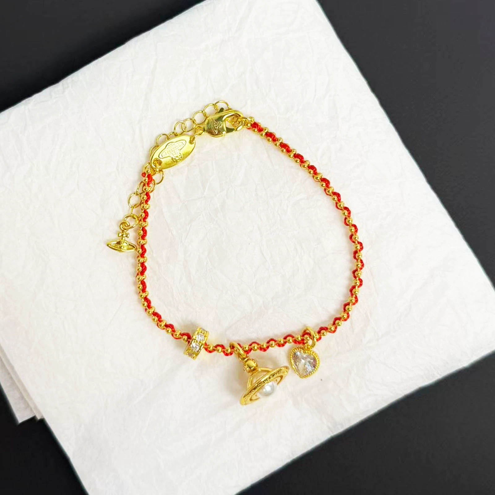 bracelet Xijia high-end version new three-dimensional Saturn pendant red string woven bracelet for women, popular item from Year of the Horse livest