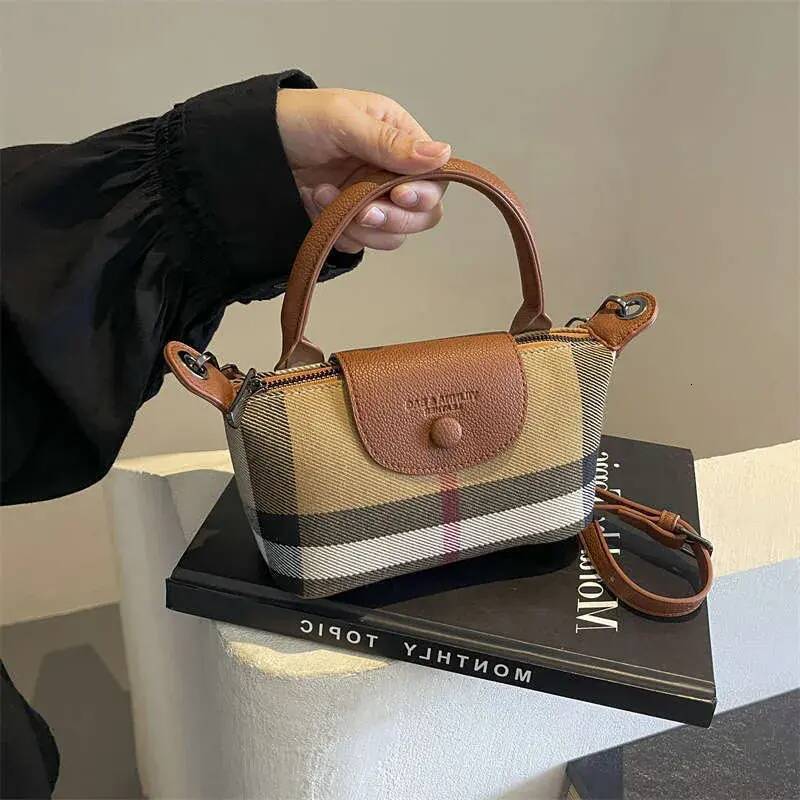 Shoulder Bag 2026 Niche fashion Mini Phone Nylon Fabric Hand Held Dumpling New Crossbody Small Handheld Coin Purse Single t1