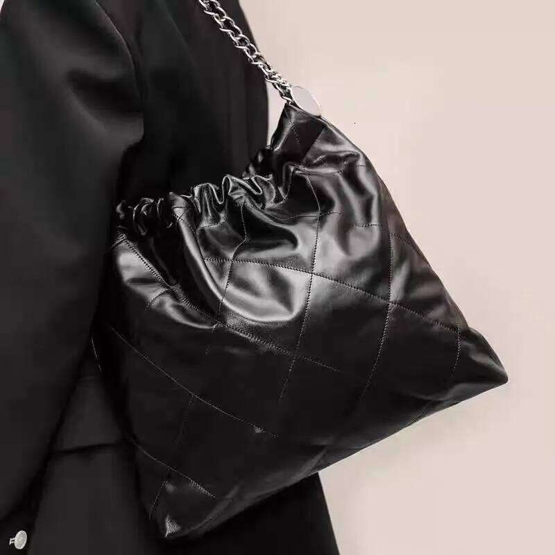 Chain one shoulder armpit luxury stray garbage shopping bag, large capacity bag Genuine leather handbag