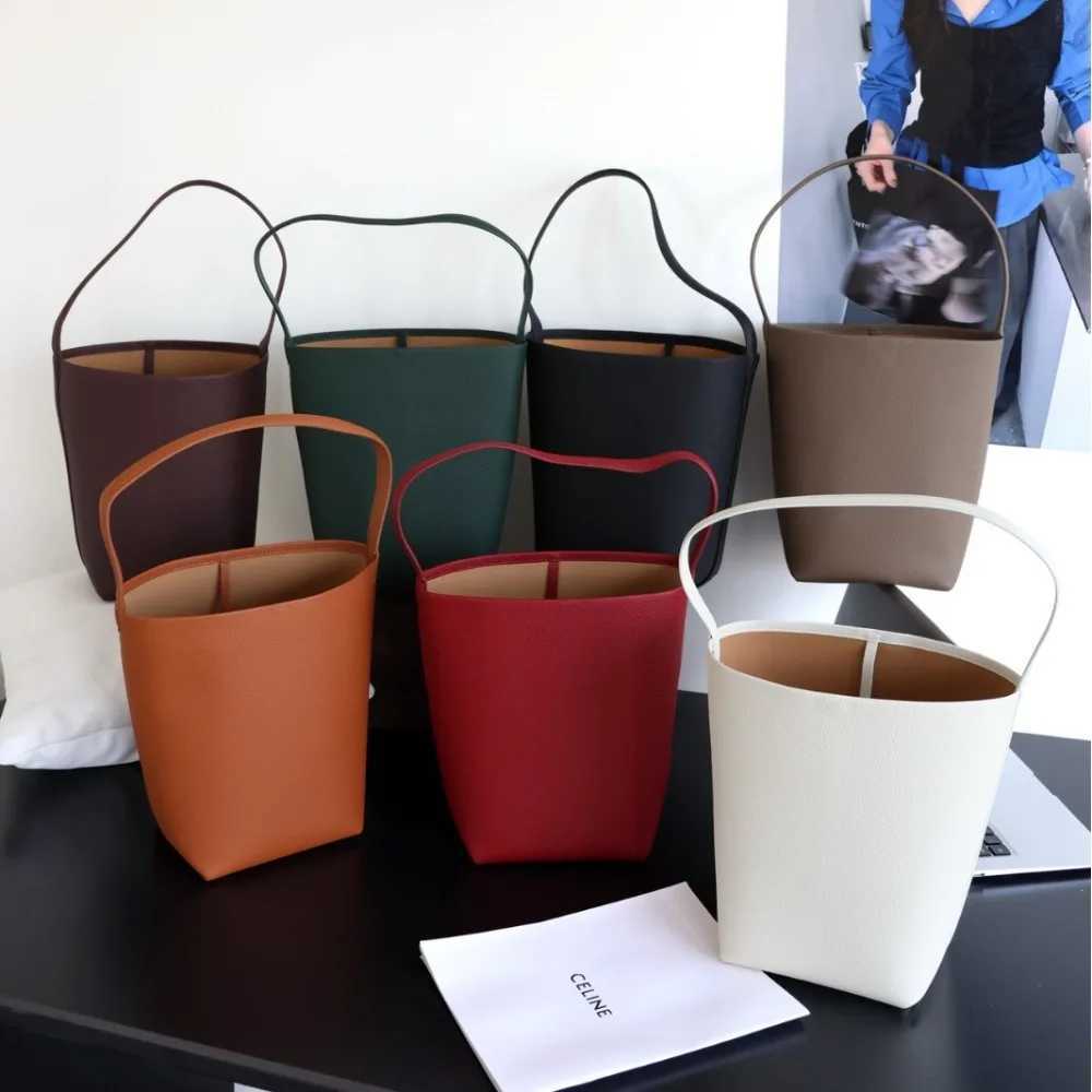 Evening Bags Bucket Simple Large-capacity Commuting Unique Texture Practical Versatile New Leather Shoulder Bag Women Simple and Practical H261016