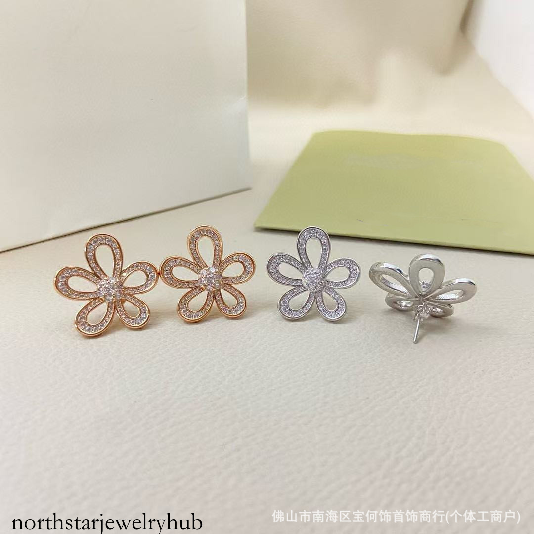 Designer Jewelry vanly sterling silver earrings, plated white gold, featuring a large flower design and fully encrusted with diamonds