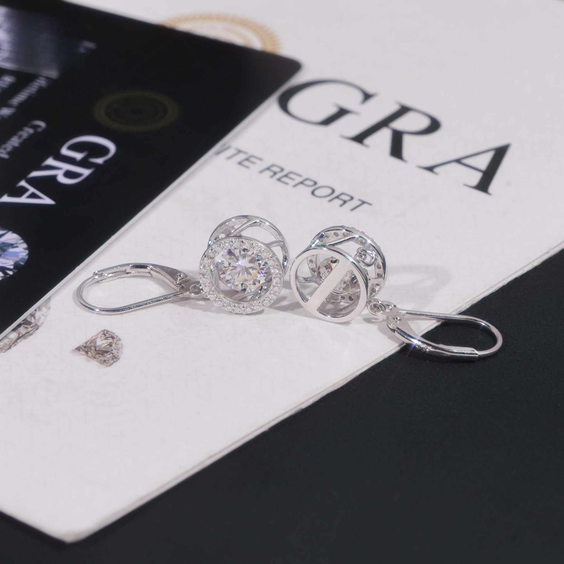 supply of fashionable new four-prong single stone hollow S925 silver inlaid with moissanite trendy earrings