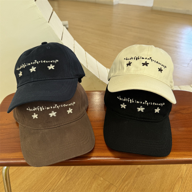 New Koreanstyle baseball cap with three small flower embroideries unisex suitable for spring autumn casual fashionable versatile and faceslimming