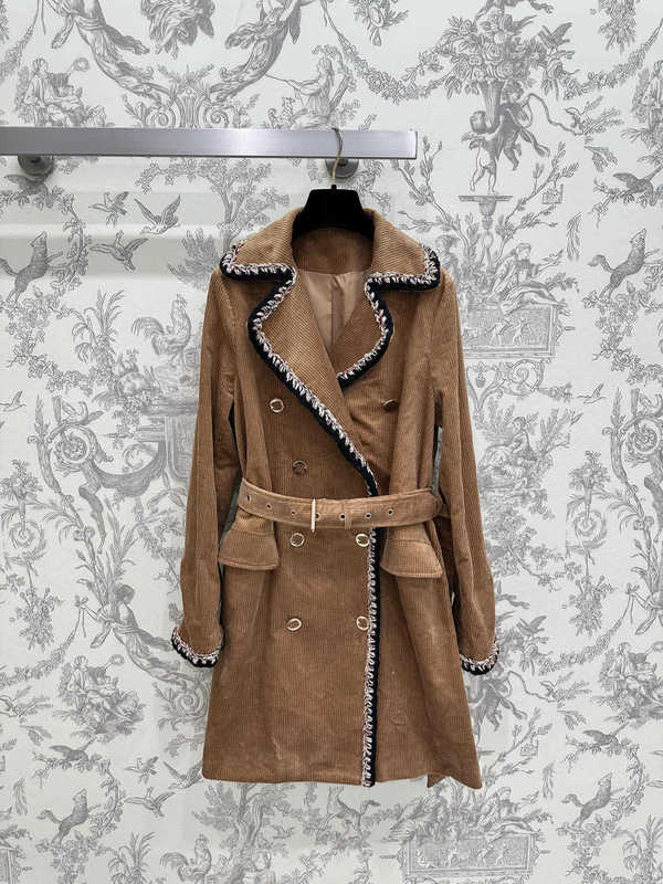 Womens Trench Coats Designer 2026 AutumnWinter New Britishstyle corduroy trench coat for women midlength doublebreasted with fitted waist offering t