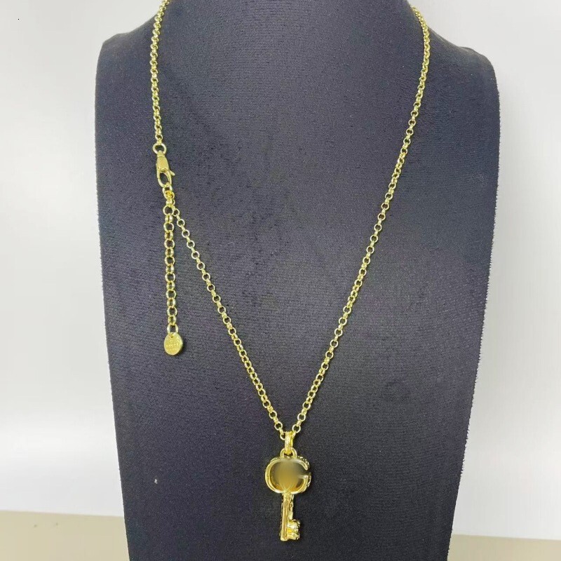 jewellery designer for women necklace featuring an artistic key design shaped round chain and a key shaped clavicle chain Guccara Necklace