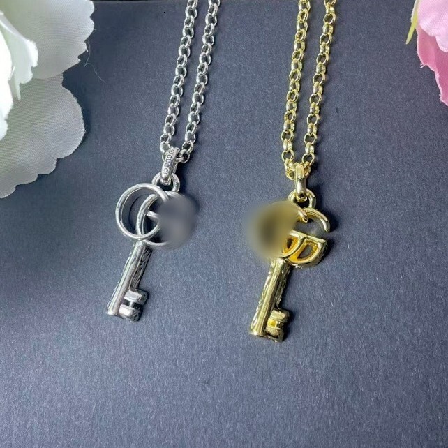jewellery designer for women necklace featuring an artistic key design shaped round chain and a key shaped clavicle chain Guccara Necklace