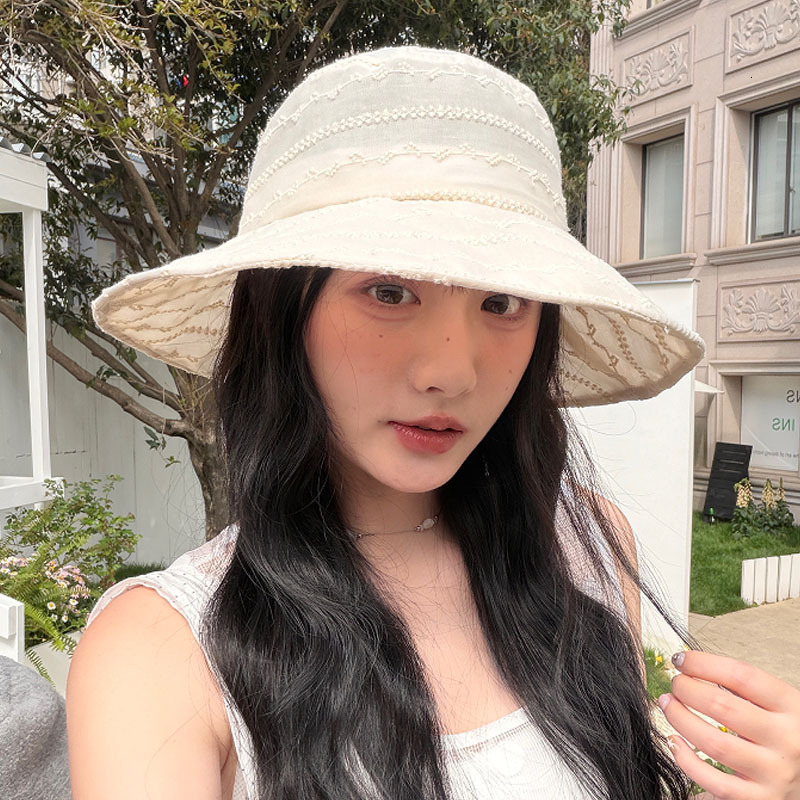 Koreanstyle minimalist embroidered bucket hat women perfect summer outdoor activities foldable with a large brim for sun protection